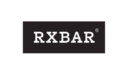 The image shows the RXBAR logo. The text "RXBAR" is centered in bold, white, uppercase letters against a black rectangular background. There is a small registered trademark symbol "®" located to the upper right of the text.