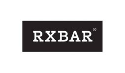 The image shows the RXBAR logo. The text "RXBAR" is centered in bold, white, uppercase letters against a black rectangular background. There is a small registered trademark symbol "®" located to the upper right of the text.